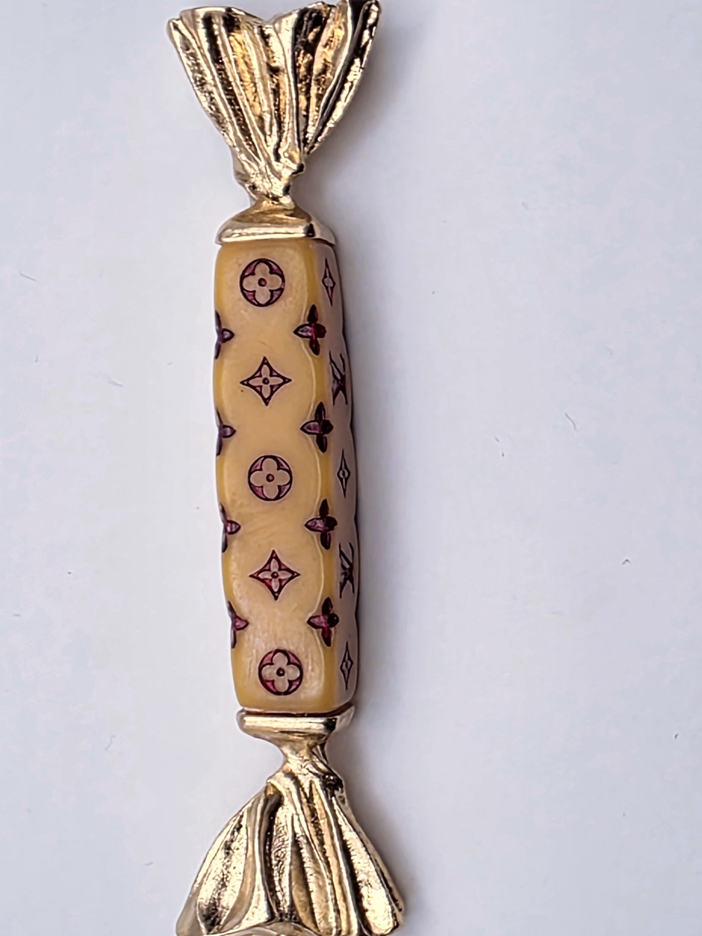 Gold-Tone Cream Enamel Candy Keychain